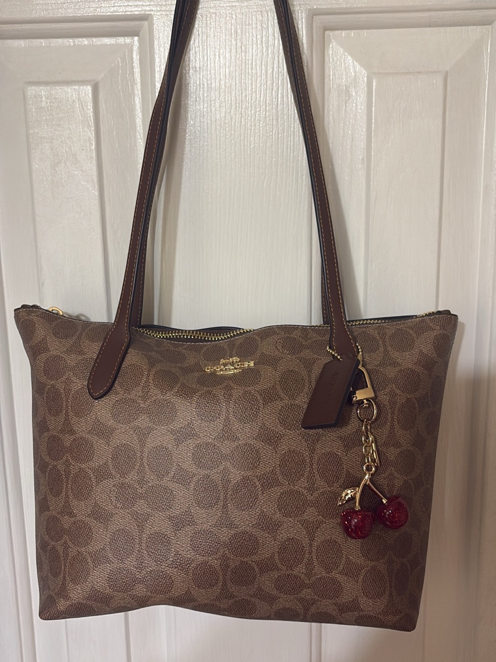 Coach Brown Signature Canvas Shoulder Tote with Cherry Charm